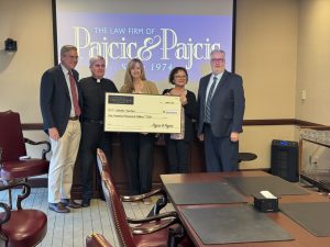 Jacksonville firm donates $100,000 to Catholic Charities amid funding cut